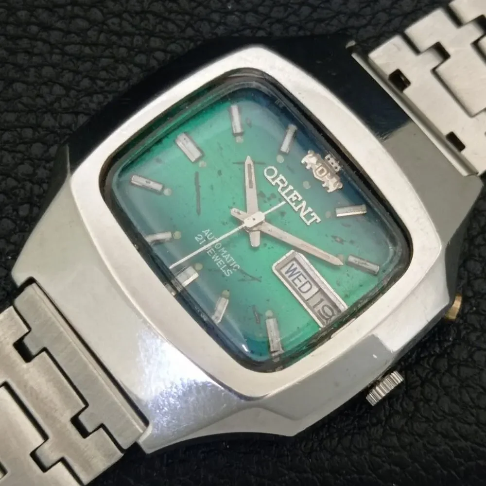 Vintage 1972 Orient Automatic Mens Silver Watch W/daydate & Green accents